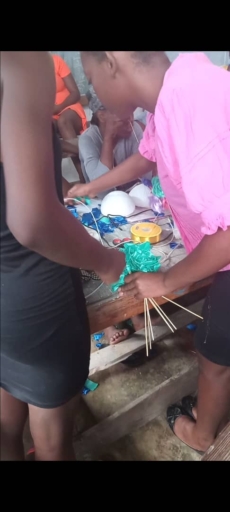 L’organisation Femmes Chrétiennes Impact au service de la communauté : formation et dons scolaires au camp de Delmas 43